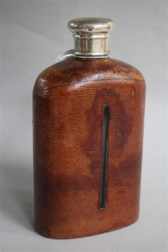 A late Victorian silver topped leather mounted glass large hip flask, Wright & Davies, London, 1891, 19.4cm.